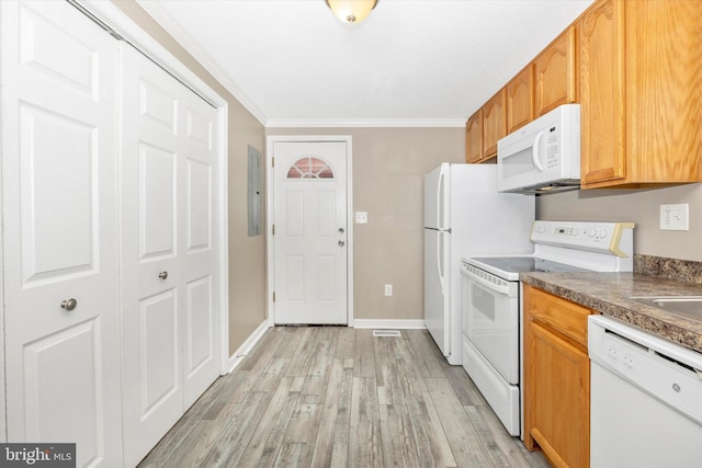 kitchen featuring white appliances, ornamental molding, and light hardwood / wood-style floors