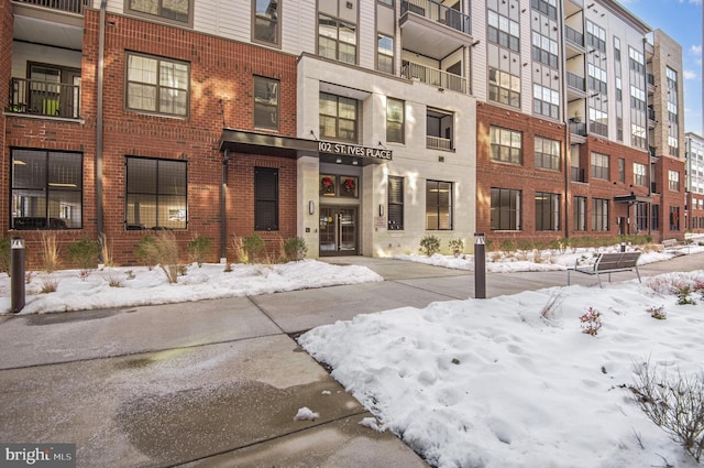 view of snow covered building