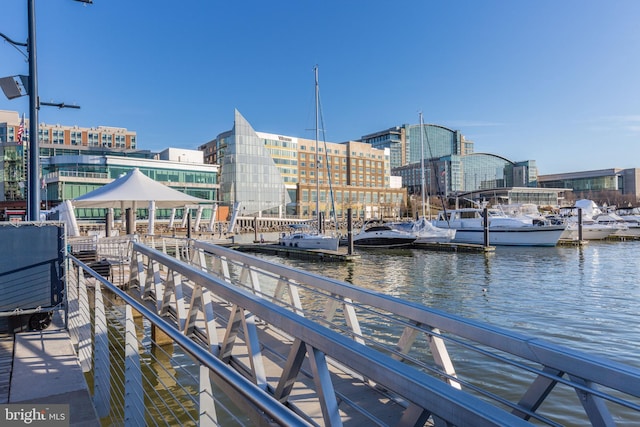 dock area featuring a gazebo and a water view