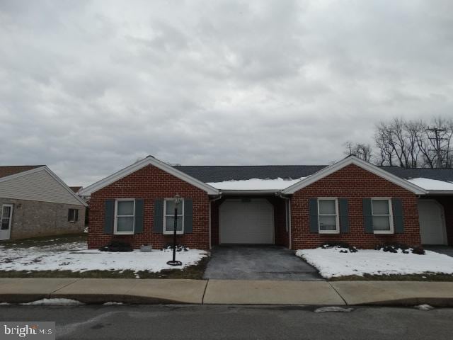 ranch-style house with a garage