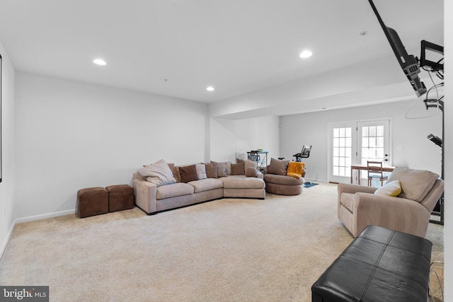 living room featuring light carpet