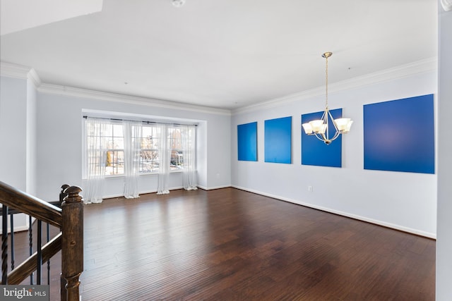 interior space with an inviting chandelier, crown molding, and dark hardwood / wood-style floors