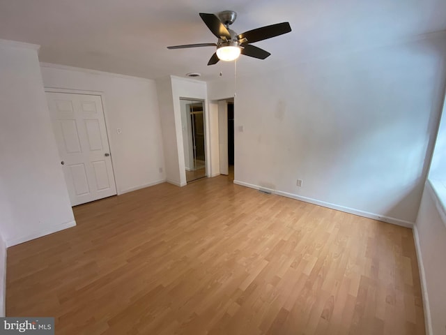 interior space featuring light wood-type flooring and ceiling fan