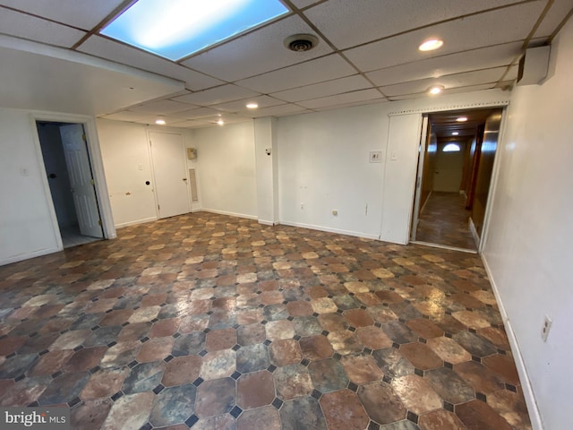 basement with a drop ceiling