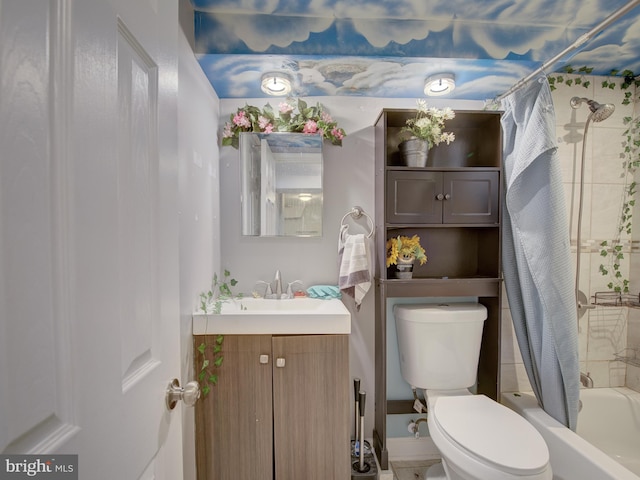 full bathroom featuring toilet, vanity, and shower / bath combo with shower curtain