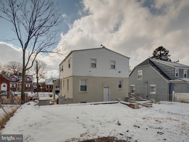 view of snow covered property