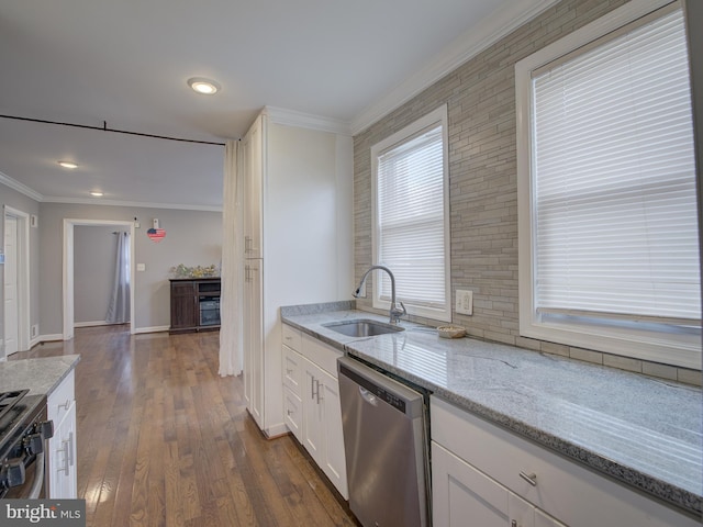 kitchen with dishwasher, sink, white cabinetry, light stone countertops, and dark hardwood / wood-style flooring