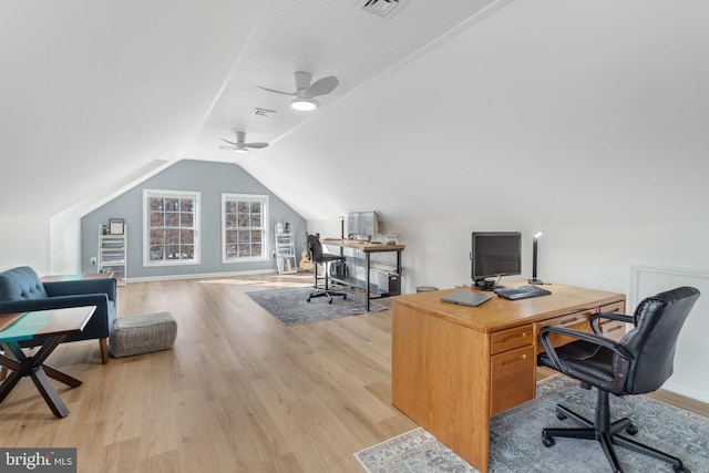 office space with vaulted ceiling, ceiling fan, and light wood-type flooring