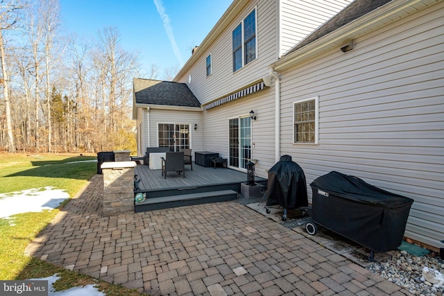 view of patio / terrace with a grill and a deck