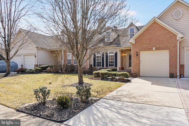 front of property with a front yard and a garage