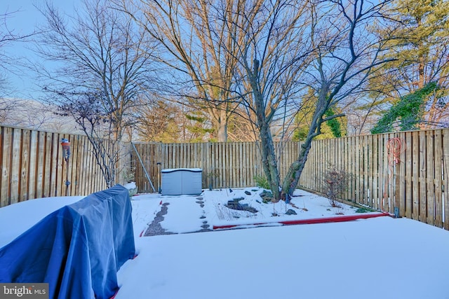 view of yard covered in snow