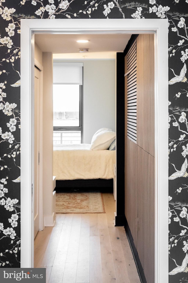 bedroom featuring light wood-type flooring