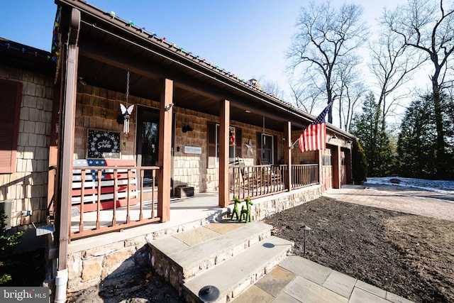 view of home's exterior featuring covered porch