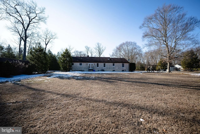 view of front of home with a front lawn