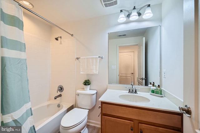 full bathroom featuring toilet, vanity, and shower / tub combo with curtain