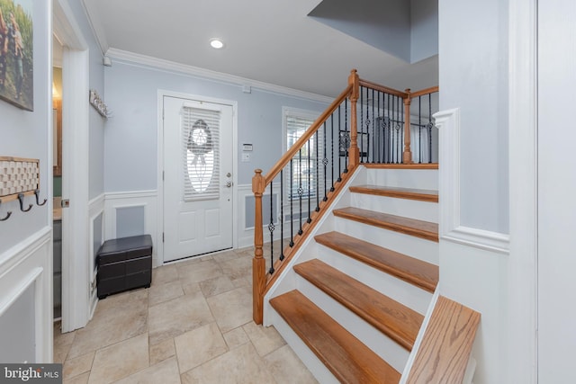 entrance foyer with ornamental molding