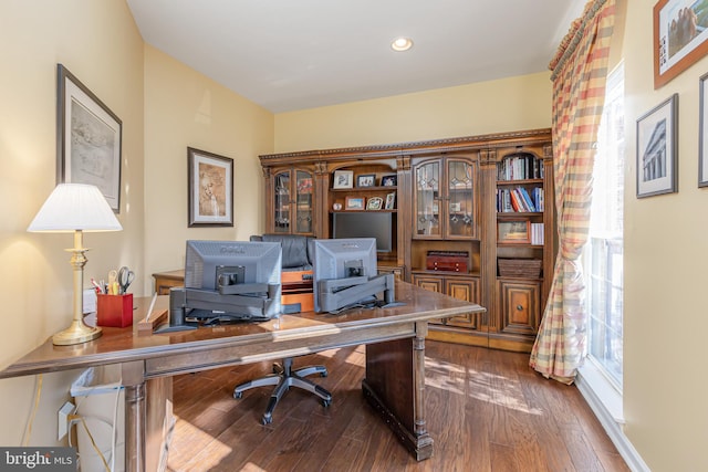 home office featuring dark hardwood / wood-style flooring