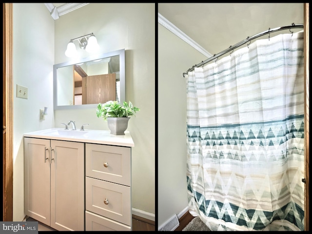 bathroom featuring crown molding, curtained shower, and vanity