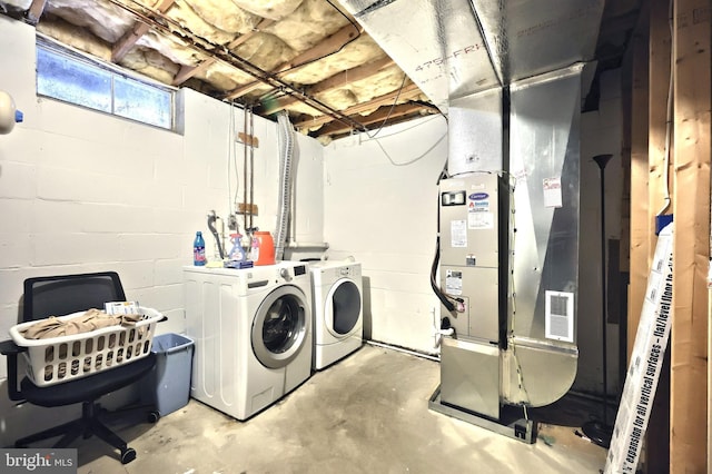 washroom with separate washer and dryer