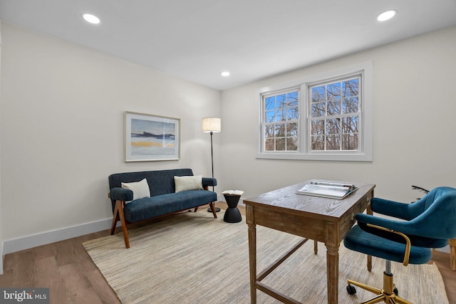 office with light hardwood / wood-style floors