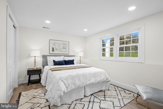 bedroom featuring a closet and hardwood / wood-style floors