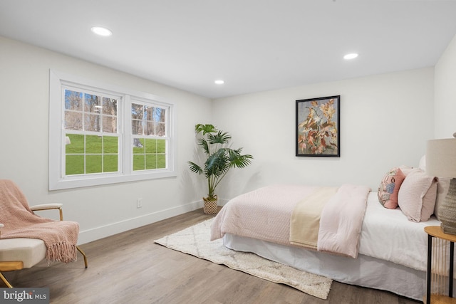 bedroom featuring hardwood / wood-style flooring