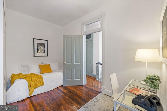 bedroom featuring dark hardwood / wood-style floors