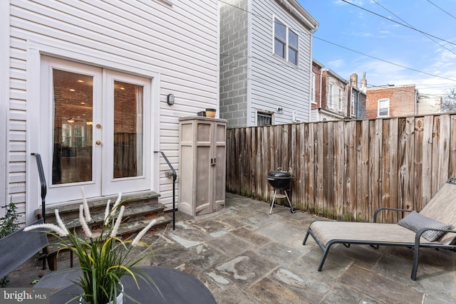 view of patio featuring french doors