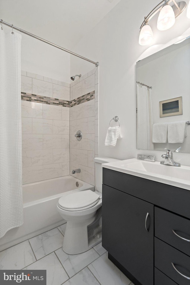 full bathroom featuring vanity, shower / bathtub combination with curtain, and toilet