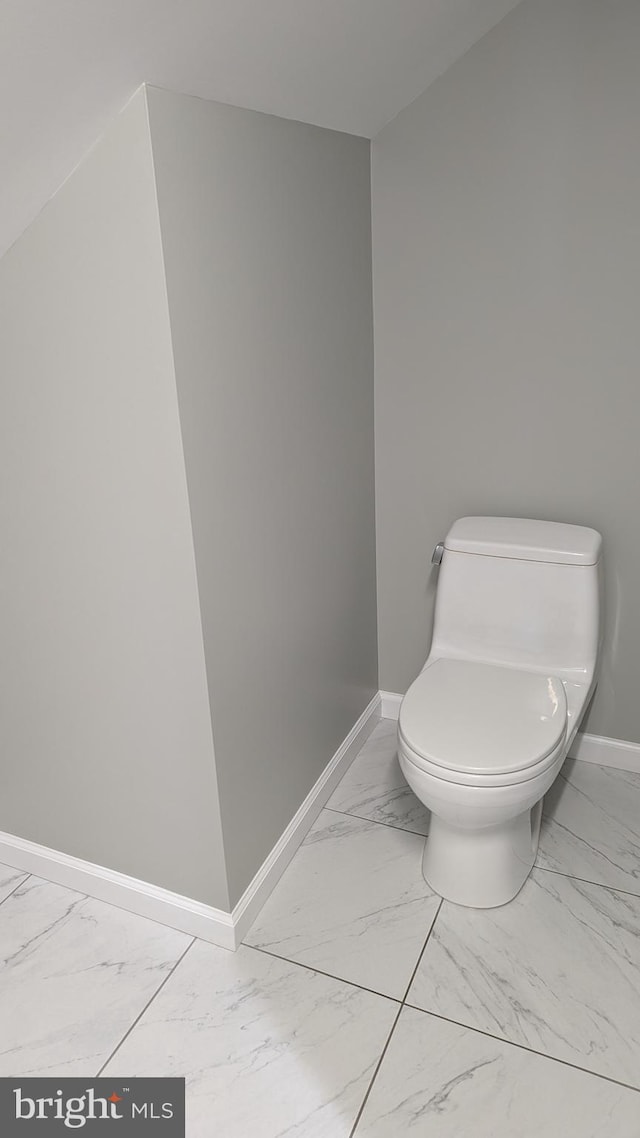 bathroom featuring toilet