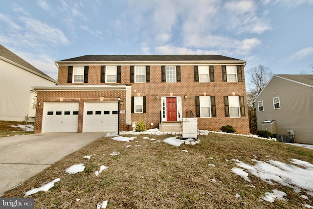 colonial house featuring a garage