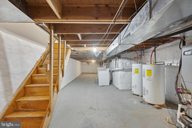 basement with water heater and washer / clothes dryer