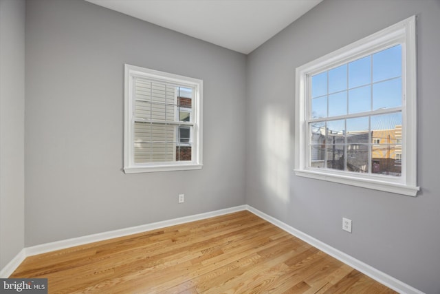 unfurnished room featuring light wood-type flooring