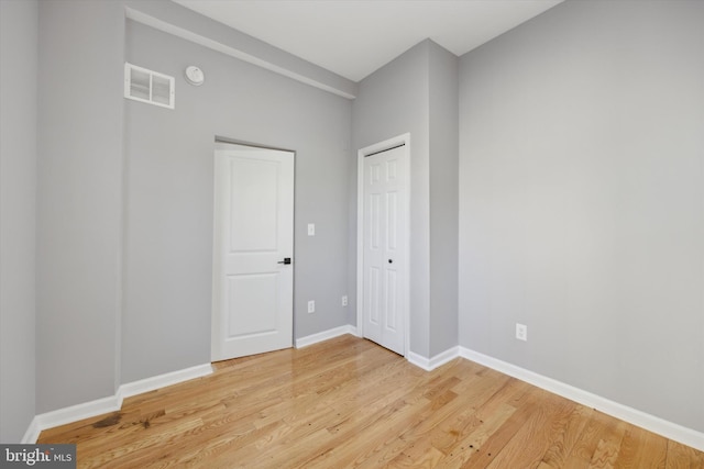 unfurnished bedroom featuring light hardwood / wood-style floors