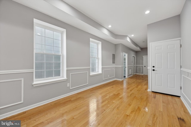 empty room with light wood-type flooring