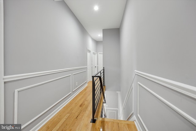 corridor featuring hardwood / wood-style flooring