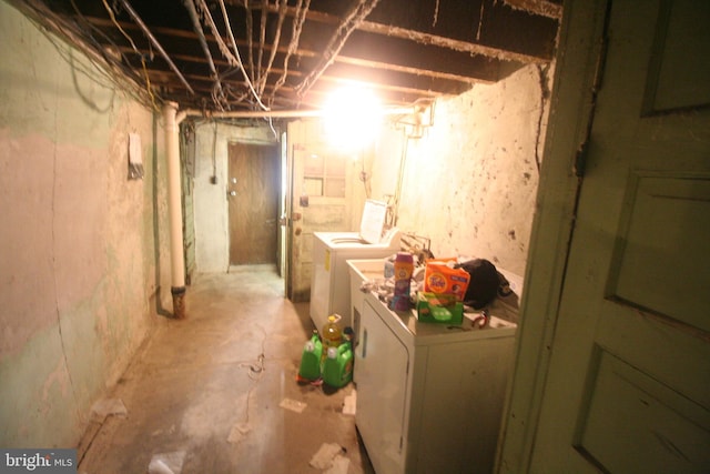 basement with washing machine and clothes dryer