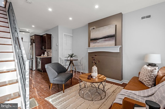 living area with dark hardwood / wood-style flooring