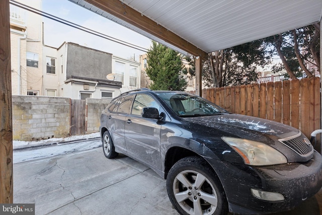 view of parking with a carport