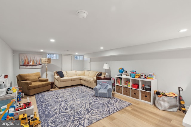 living room with light hardwood / wood-style floors