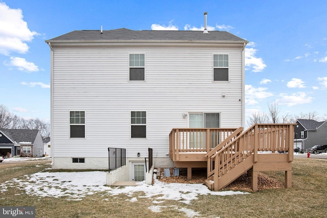 back of property featuring a deck