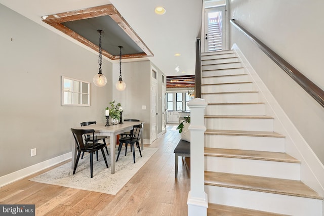 stairway featuring hardwood / wood-style flooring