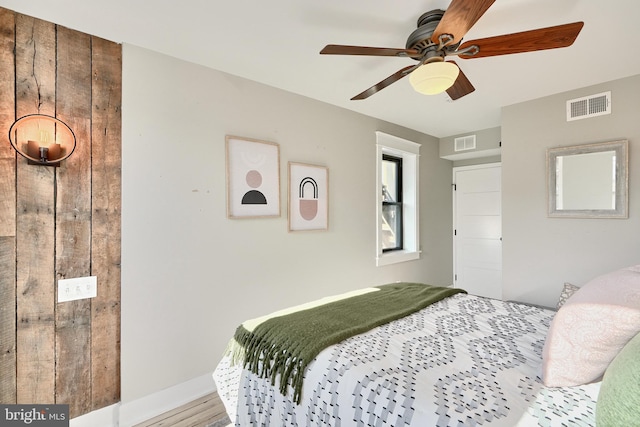 bedroom featuring light wood-type flooring and ceiling fan