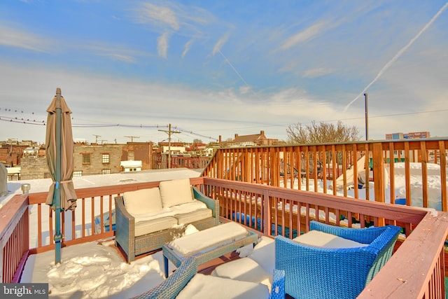 wooden deck with an outdoor hangout area