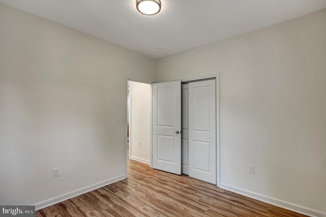 unfurnished bedroom featuring light hardwood / wood-style flooring