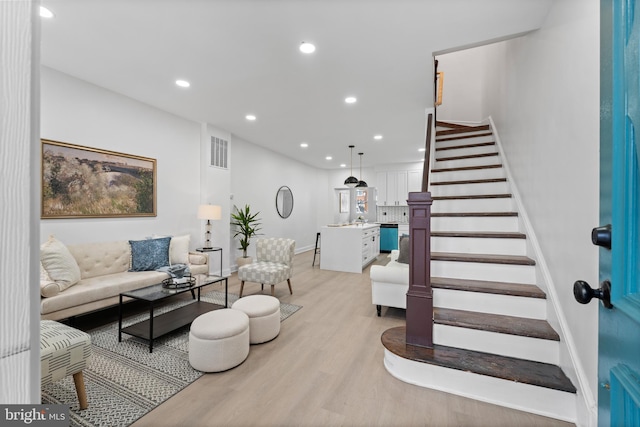 living room featuring light hardwood / wood-style floors