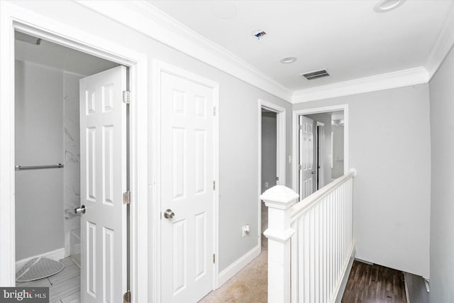 hall featuring crown molding