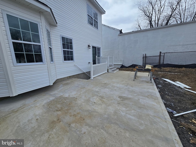 view of patio with fence