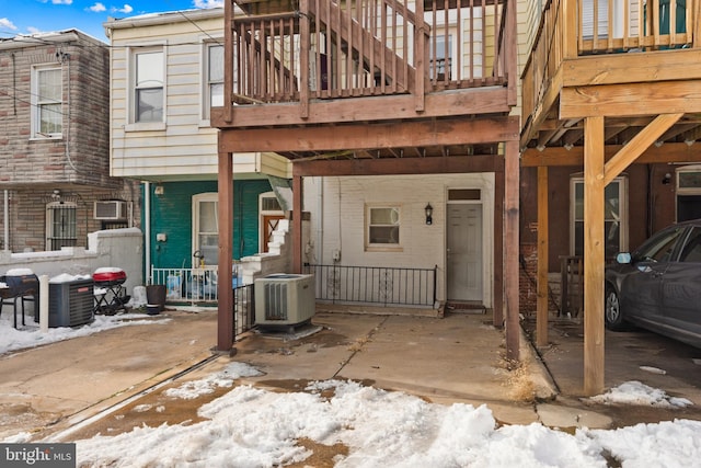 exterior space featuring central AC unit