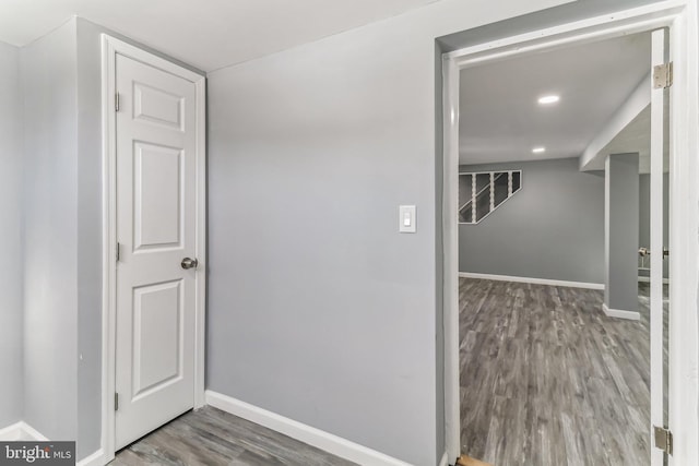 hallway featuring dark wood-type flooring